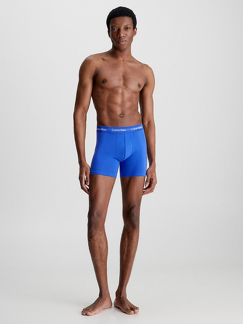 Calvin Klein #N/A boxer briefs in blue color shown on model from the front, featuring signature elastic waistband.