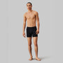 Calvin Klein COTTON STRETCH Mens 3 Pack Boxer Briefs Multicoloured side view model wearing black boxer briefs.