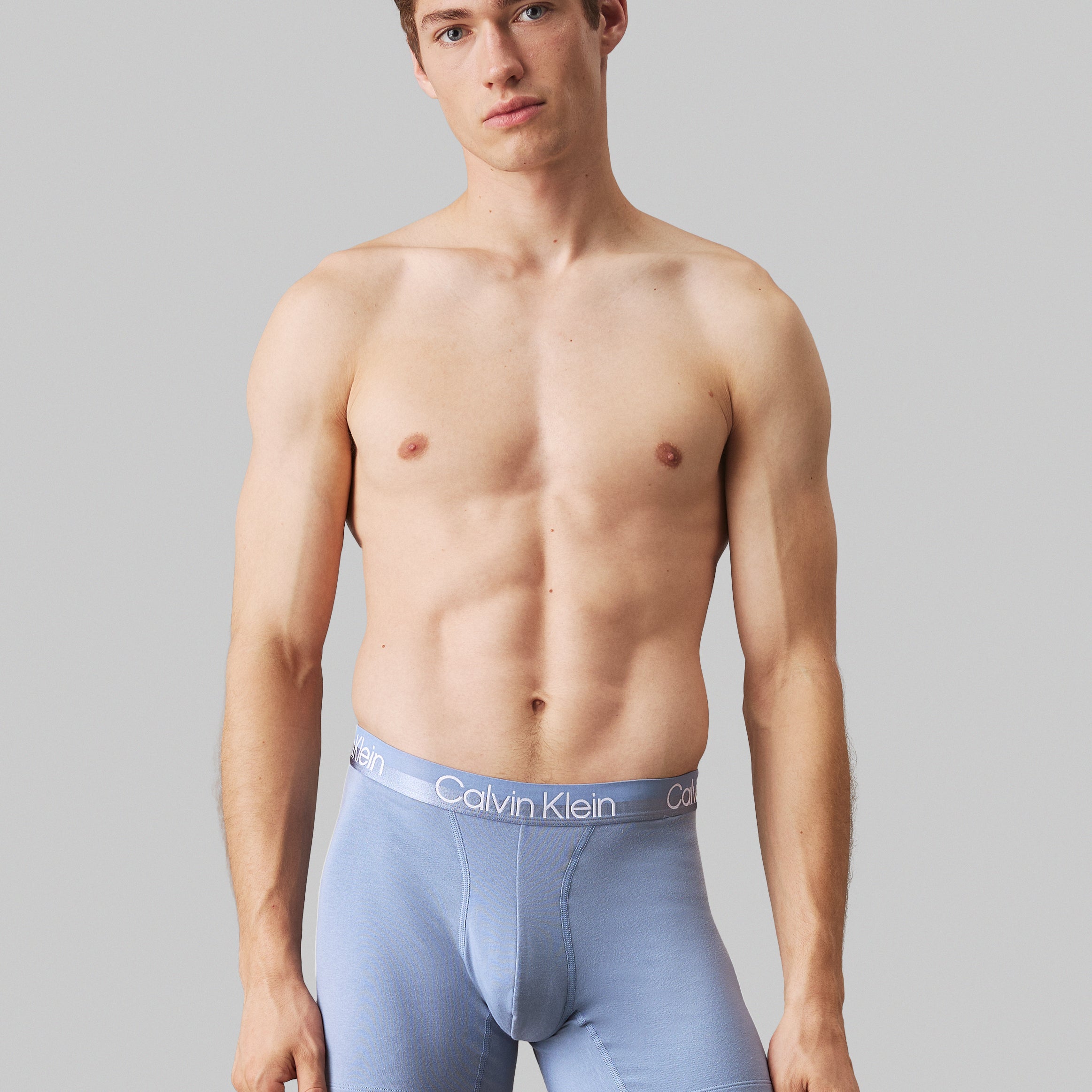 Calvin Klein MODERN STRUCTURE COTTON Mens 3 Pack Boxer Briefs Multicoloured front view, model wearing light blue boxer briefs.