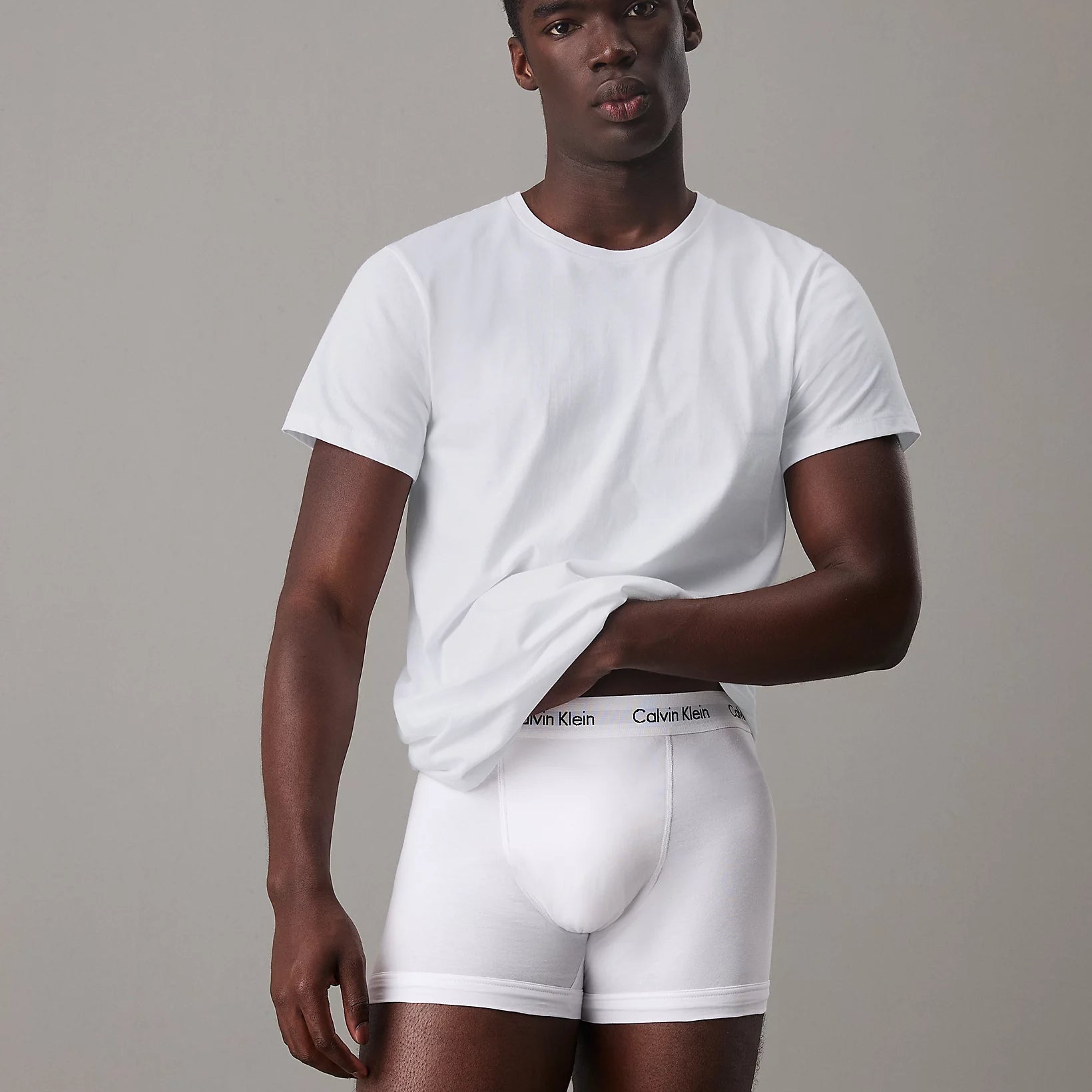 Calvin Klein CREW NECK 3 Pack Mens Cotton T-Shirts White front view worn by model, showcasing soft cotton fabric and regular fit.