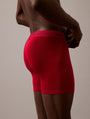 Calvin Klein MC HOLIDAY FASHION Mens 3 Pack Boxer Briefs Multicoloured side view of model wearing red boxer briefs