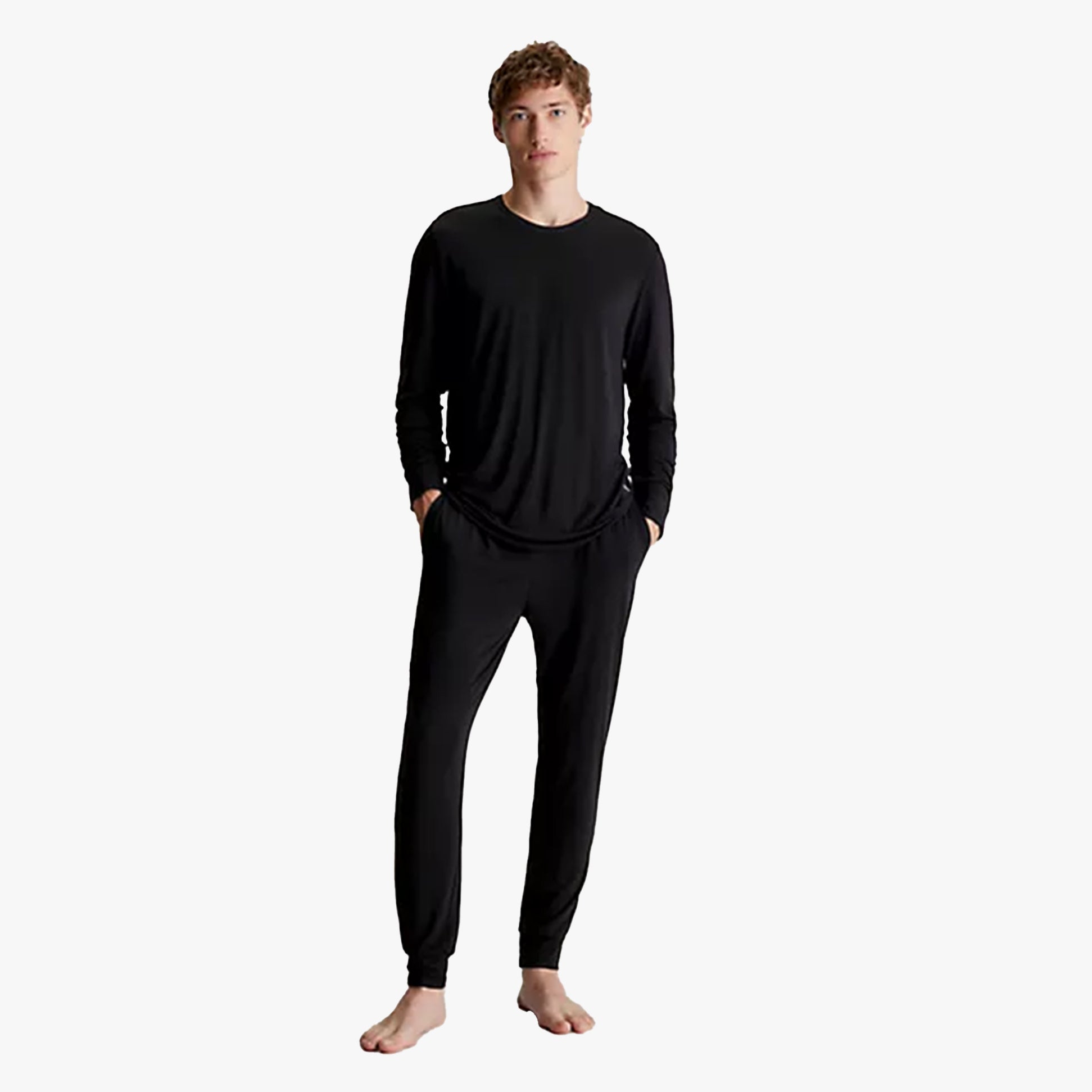 Calvin Klein ULTRA SOFT UB1 Mens Sweatshirt Black front view model wearing long sleeves with matching pants.