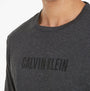 Calvin Klein INTENSE POWER Mens Crew Neck Grey close-up detail view showcasing the Calvin Klein logo on chest.