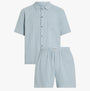 Calvin Klein SHORT SET Mens Arona front view, lightweight cotton short sleeve button-up shirt and shorts in light blue.