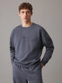 Calvin Klein COTTON FLEECE Mens Sweatshirt Turbulence / Ink front view on model detailing comfortable fit and style.