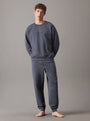 Calvin Klein COTTON FLEECE Mens Sweatshirt Turbulence / Ink front view on model, paired with matching pants, styled casually.