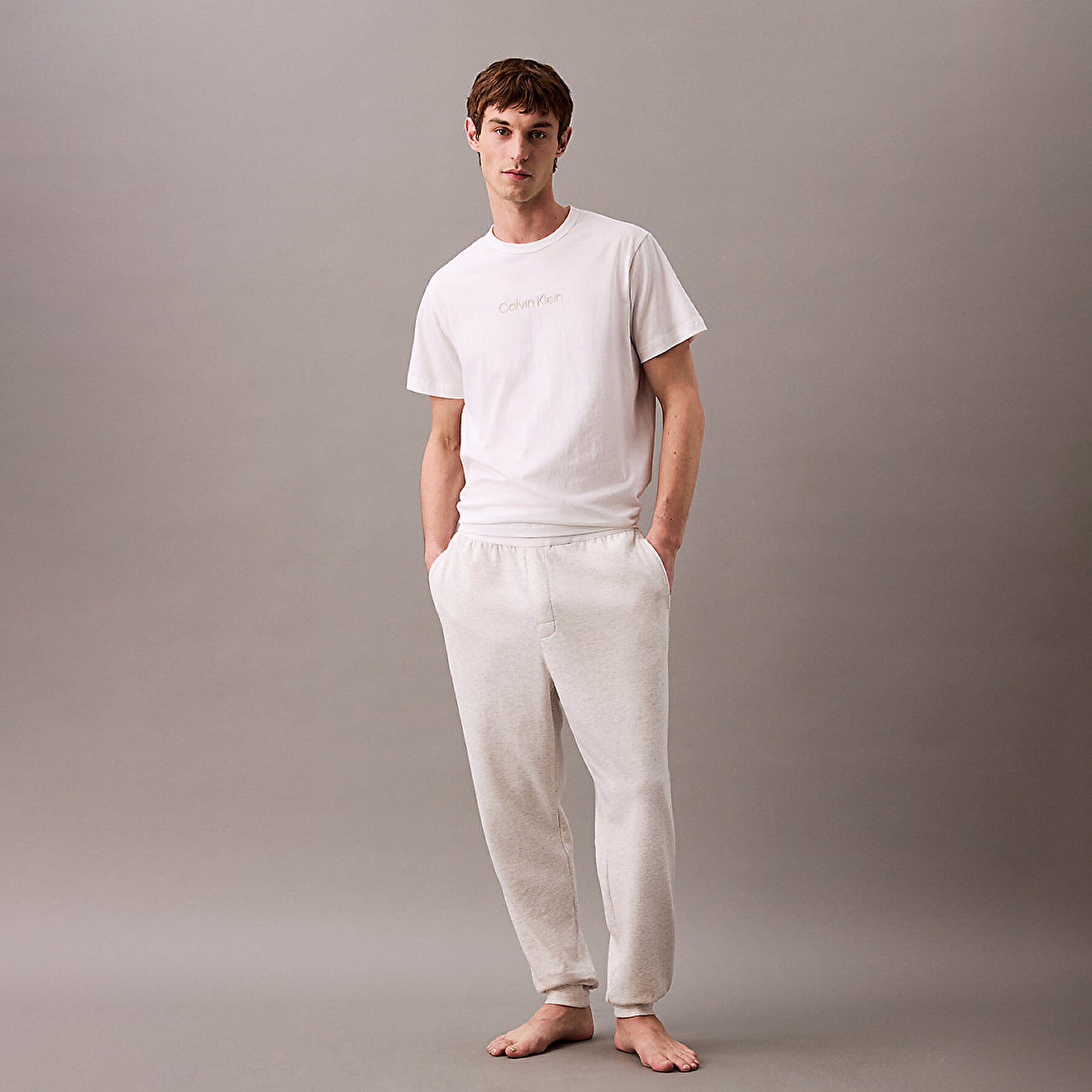 Calvin Klein ICON COTTON TERRY Mens Lounge Joggers Grey Heather front view model wearing joggers with white t-shirt