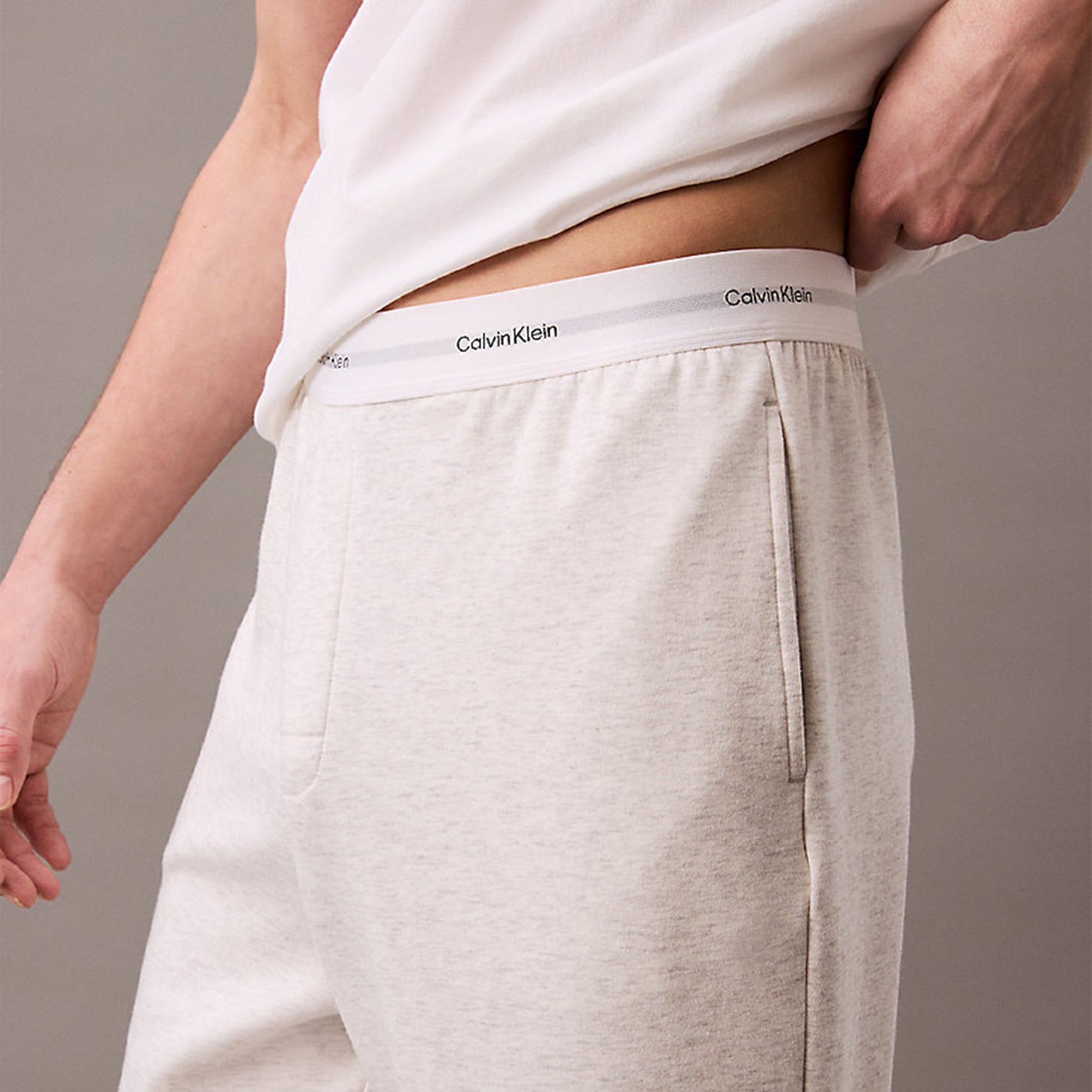 Calvin Klein ICON COTTON TERRY Mens Lounge Joggers Grey Heather side view highlighting CK waistband and rib-knit cuffs.