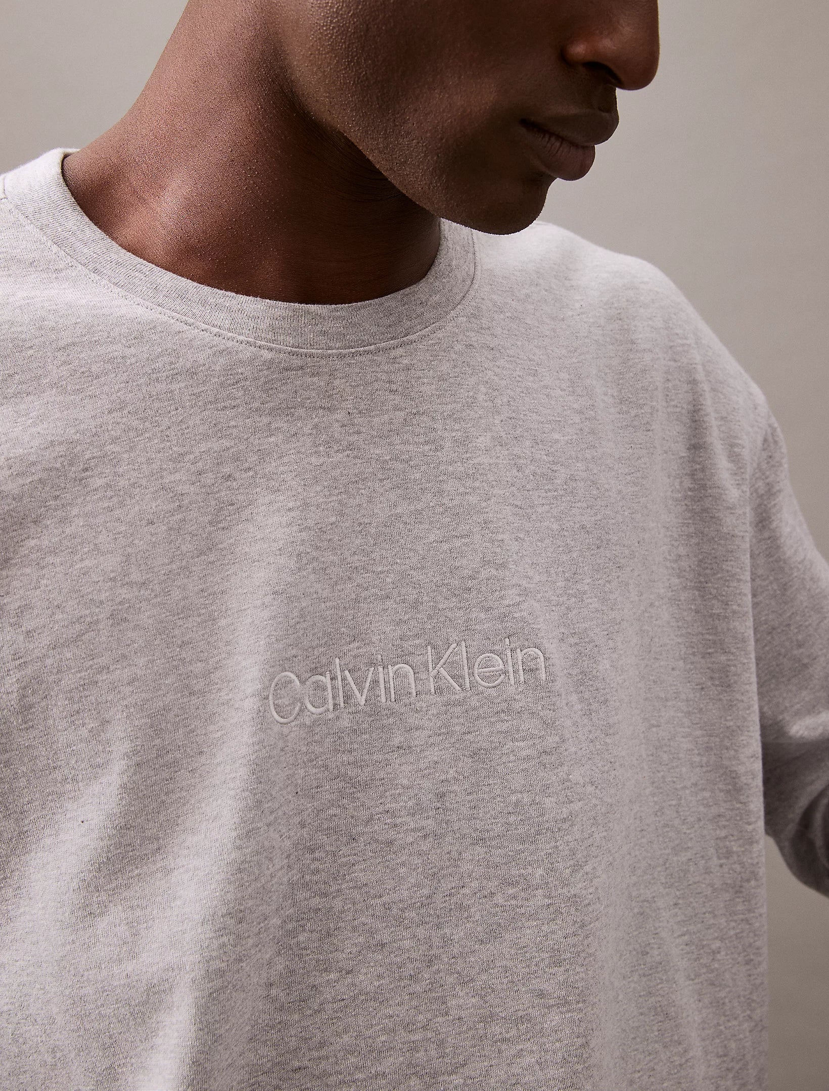 Calvin Klein MODERN TERRY Mens Sweatshirt Grey Heather close-up of logo detail on fabric