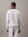Calvin Klein MODERN TERRY Mens Sweatshirt Grey Heather back view on model, showcasing comfort and style.