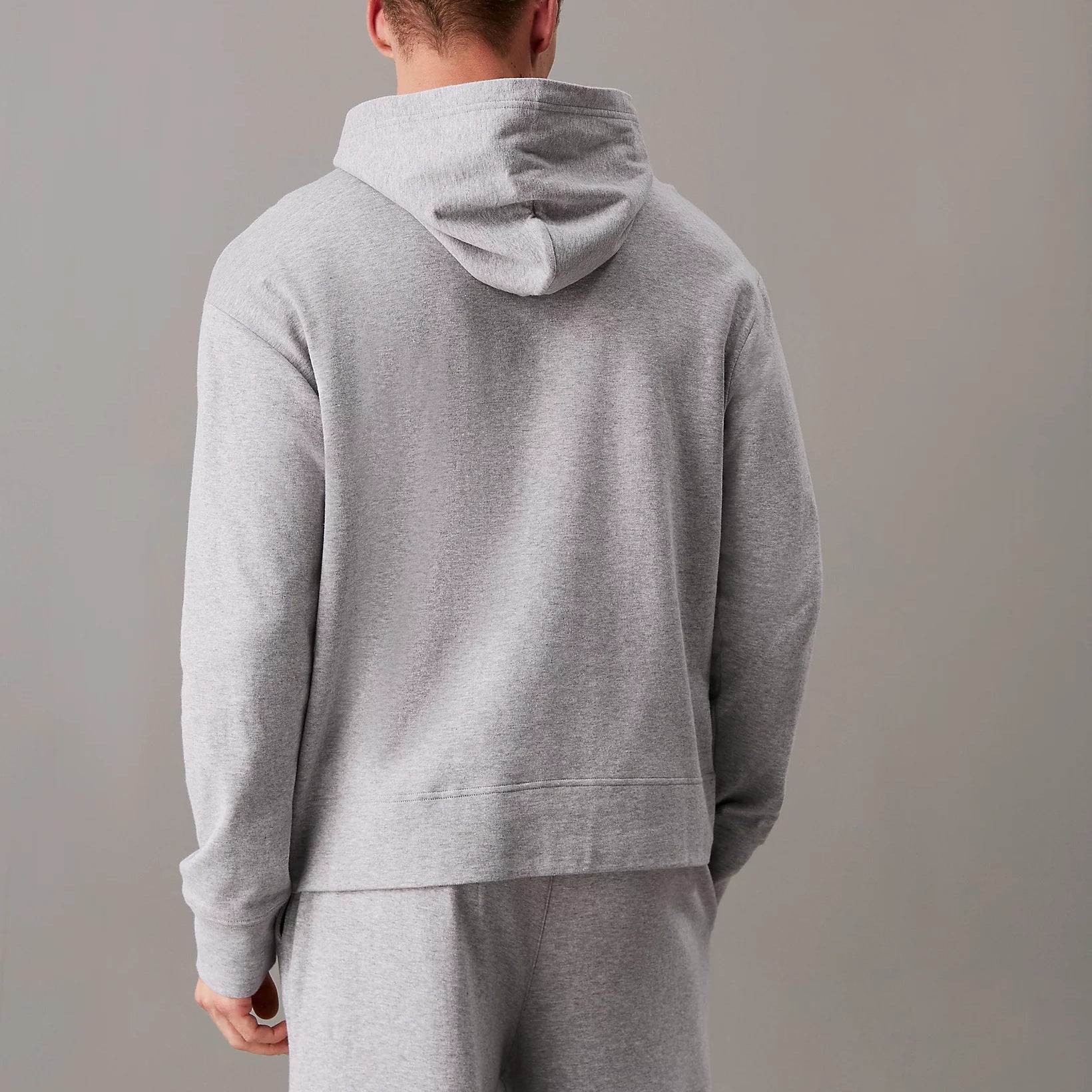 Calvin Klein ICON COTTON TERRY Mens Hoodie Grey back view showcasing relaxed fit and soft terry material.