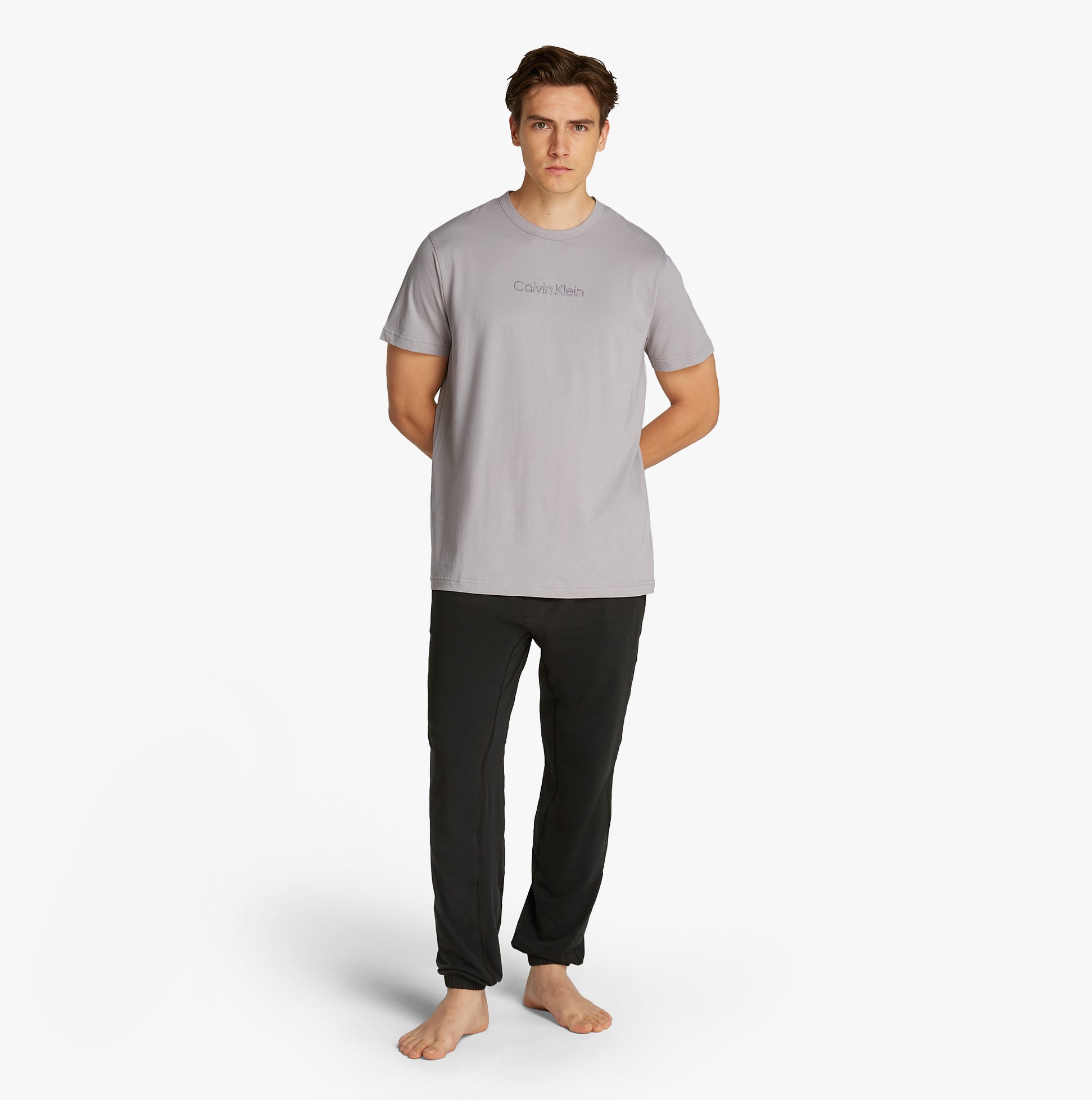 Calvin Klein 100% COTTON Mens Lounge T-Shirt Ash front view on model, featuring crew neckline and CK embroidery.