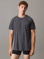 Calvin Klein LOGO COTTON Mens Crew Neck T Shirt Dark Grey Heather front view on model, showcasing matching chest logo.