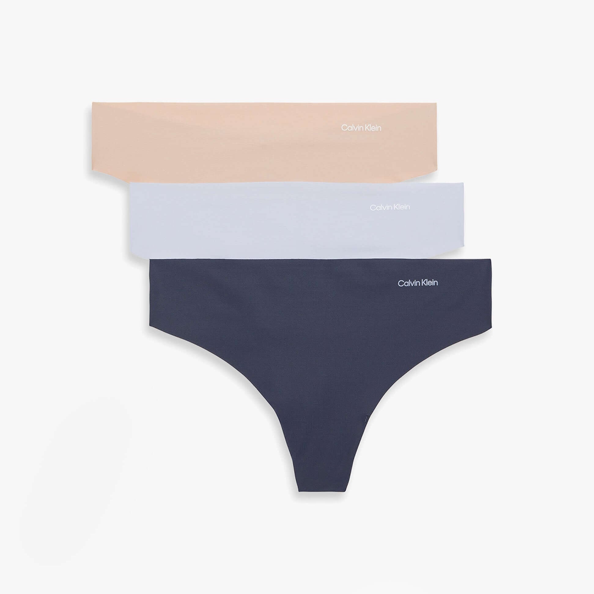 Calvin Klein Womens Invisible 3 Pack Thong Multi front view showing three thong colors: beige, light blue, and navy.