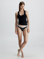 Calvin Klein LACE BIKINI Womens Bried Black front view on model wearing a black tank top and bikini.
