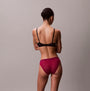 Calvin Klein BIKINI 3 PACK Womens Bikini Multicoloured, back view of model in black bra and pink bikini bottom.