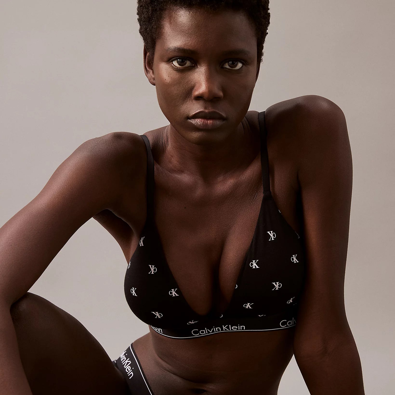Calvin Klein MODERN COTTON Womens Triangle Bra Black Diamond Logo Print detail view on model, showcasing the design and fit.