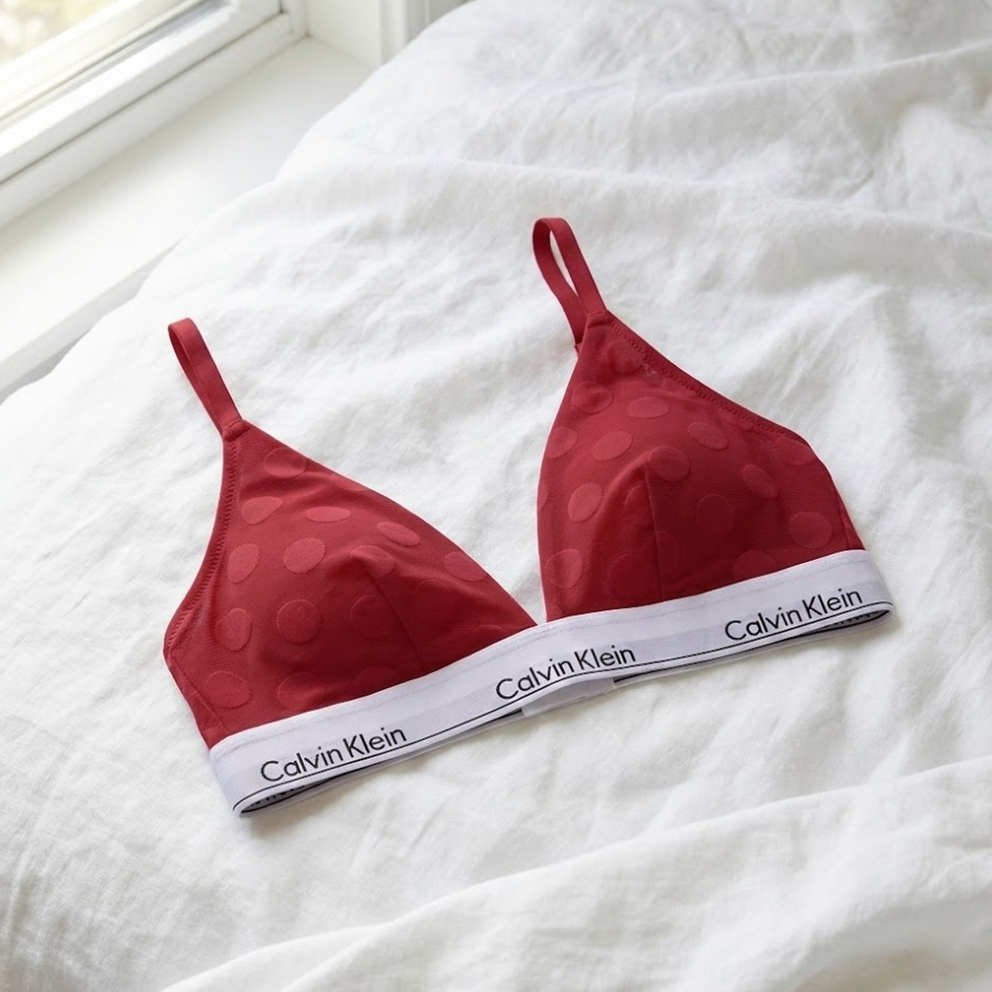 Calvin Klein UNLINED TRIANGLE XAT Womens Bra Rouge front view with polka dots and signature underband.