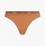 Calvin Klein Womens Thong Sandalwood front view showing the soft tone and elasticated waistband with Calvin Klein logo.