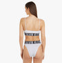 Calvin Klein INTENSE POWER Unlined Bralette Womens White back view showcasing elastic underband and adjustable straps.