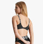 Calvin Klein INTENSE POWER Lined Bralette Womens Black back view showcasing adjustable straps and soft moulded cups.