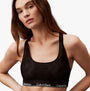 Calvin Klein LACE Unlined Bralette Womens Black front view featuring semi-sheer graphic lace and racerback design.