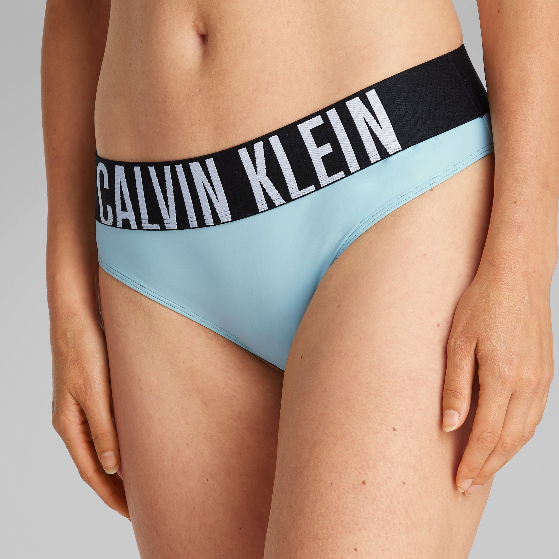 Calvin Klein INTENSE POWER Womens Bikini Briefs Ether side view highlighting the CK signature branded elastic waistband.