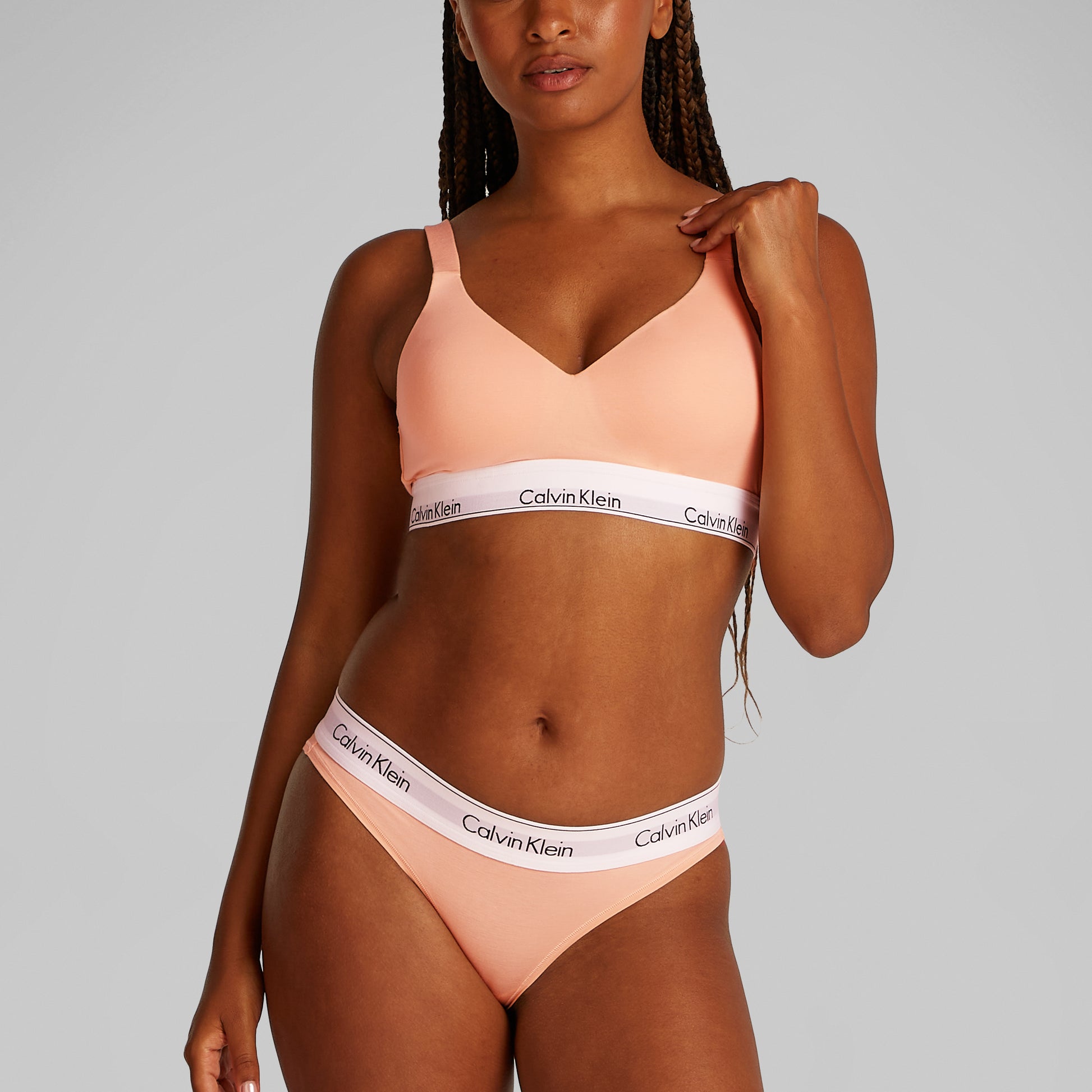 Calvin Klein ICON COTTON Womens Lift Bralette Melon Frenzy front view showcasing soft moulded cups and adjustable straps.
