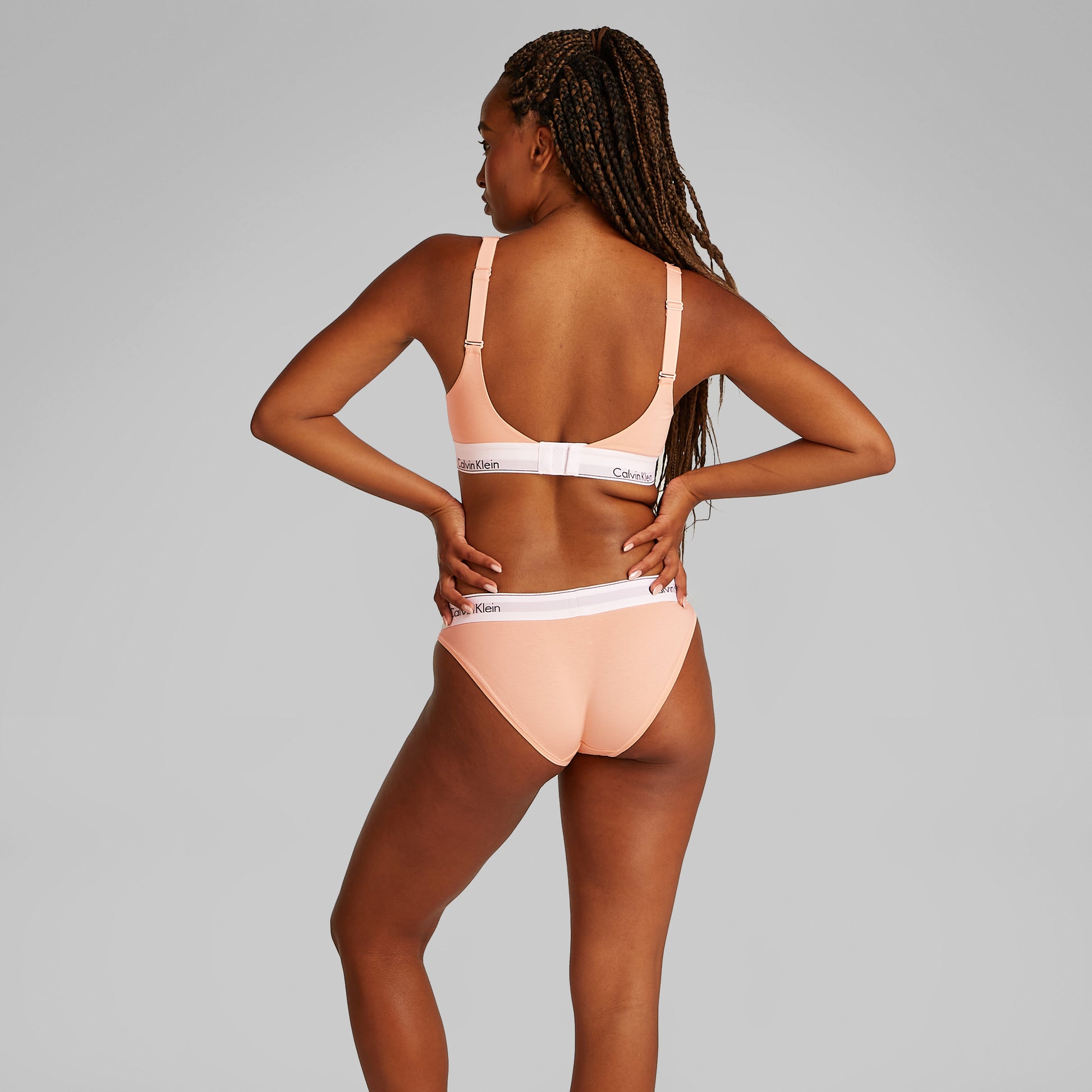 Calvin Klein ICON COTTON Womens Lift Bralette Melon Frenzy back view showcasing adjustable straps and branded underband.