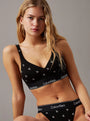 Calvin Klein MODERN COTTON Womens Lift Bralette Black Diamond Logo Print front view featuring model wearing the bralette.