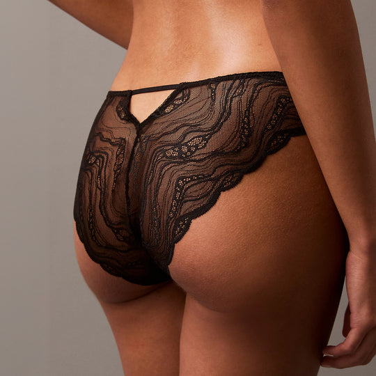 Calvin Klein CK INSTINCT Womens Bikinis Black, back view highlighting lace detail and scalloped edges.