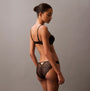 Calvin Klein CK INSTINCT Womens Bikinis Black side view showing elegant design and fit, showcasing quality materials and styling.