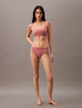 Calvin Klein TONAL LOGO COTTON Womens Bralette Red Grape W/ Apple Butter Logo, front view on model wearing matching underwear.