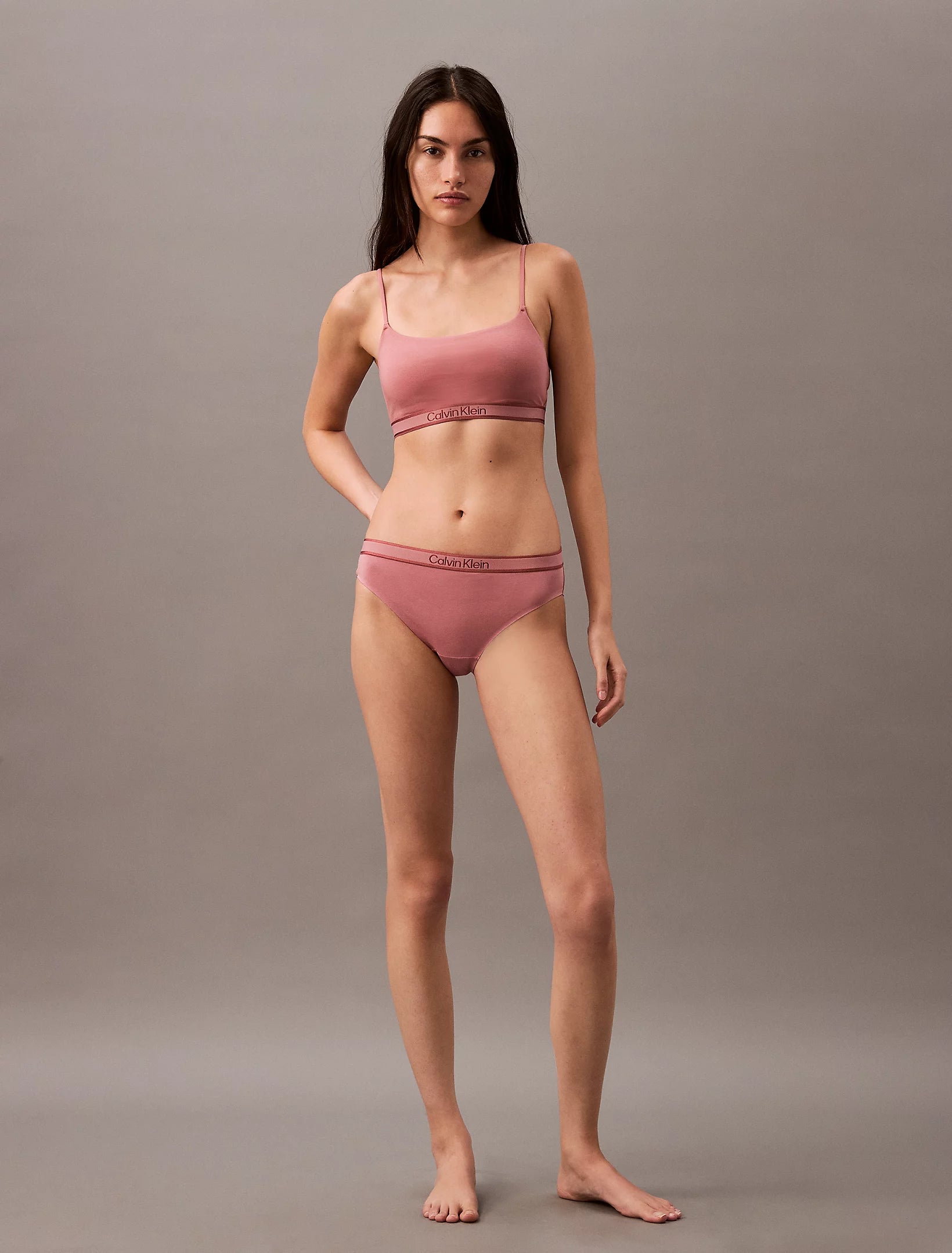 Calvin Klein TONAL LOGO COTTON Womens Bralette Red Grape W/ Apple Butter Logo, front view on model wearing matching underwear.