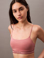 Calvin Klein TONAL LOGO COTTON Womens Bralette Red Grape W/ Apple Butter Logo front view model wearing