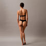 Calvin Klein CK ESTABLISHED Womens Thong Black back view on model displaying fit and design details.