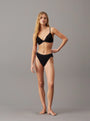 Calvin Klein MODERN LACE Womens Triangle Bra Black front view on model with matching black underwear.