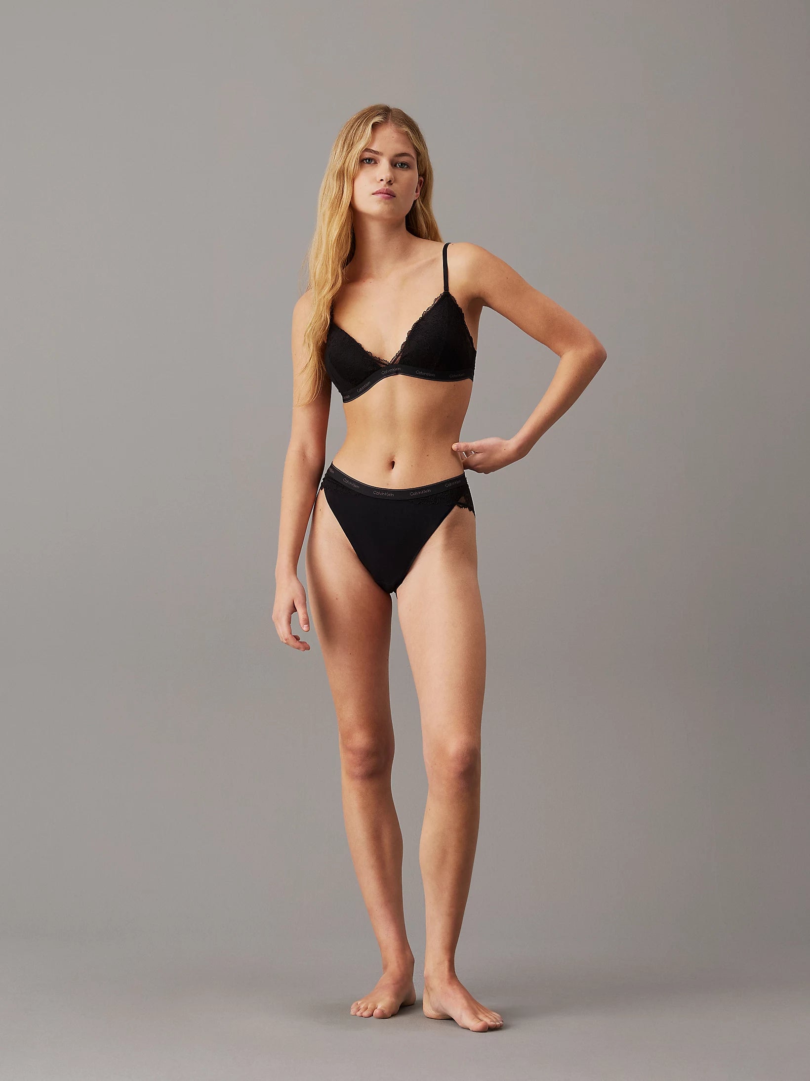 Calvin Klein MODERN LACE Womens Triangle Bra Black front view on model with matching black underwear.