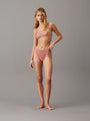 Calvin Klein ICON LACE Womens Tanga Red Grape side view model wearing matching set.