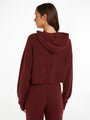Calvin Klein Womens Hooded Sweater Tawny Port Red back view showcasing the cropped design and hood detail.