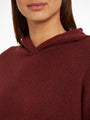 Calvin Klein Womens Hooded Sweater Tawny Port Red close-up detail view of the hood and fabric texture.