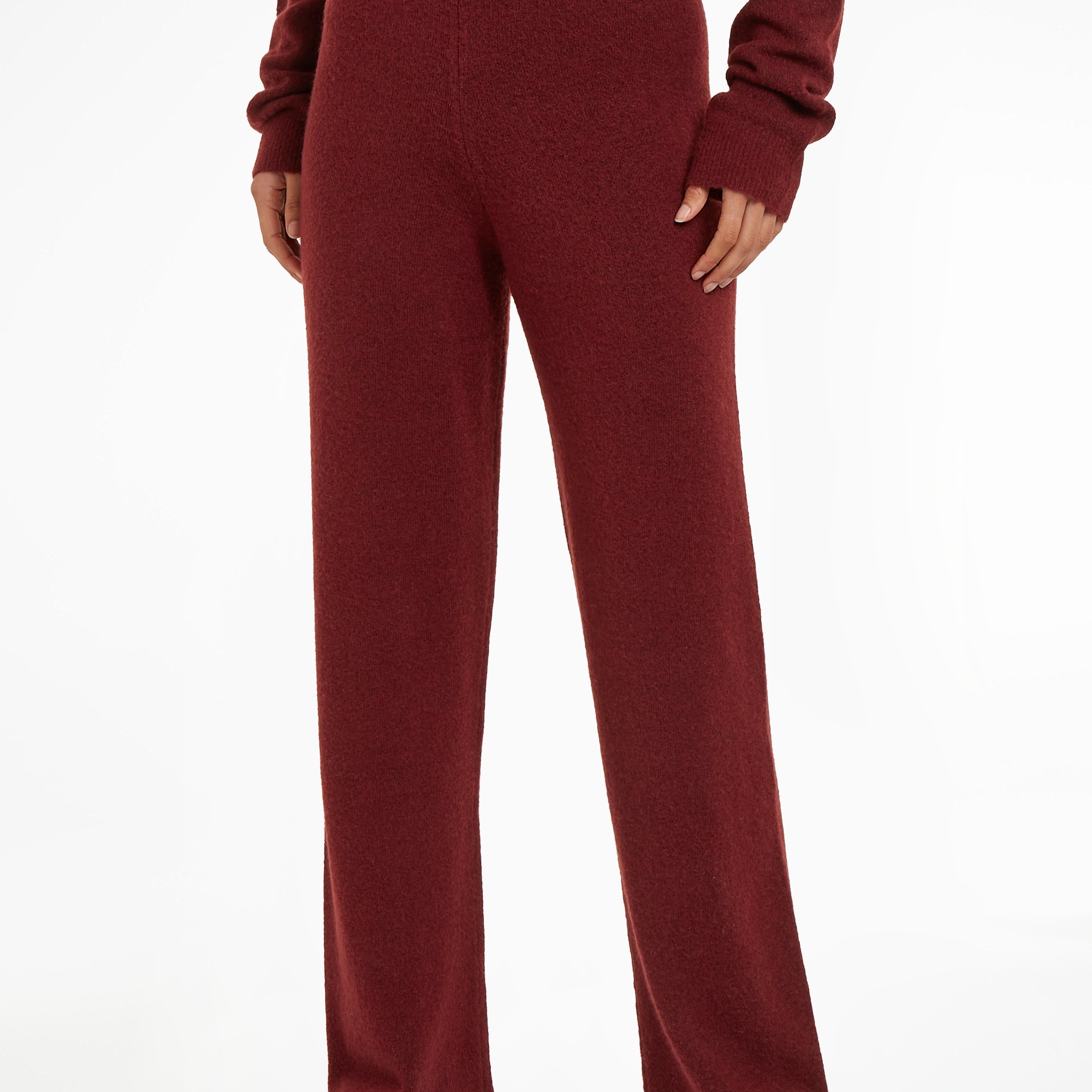 Calvin Klein Womens Pants Tawny Port Red front view showcasing relaxed fit and soft fabric design.