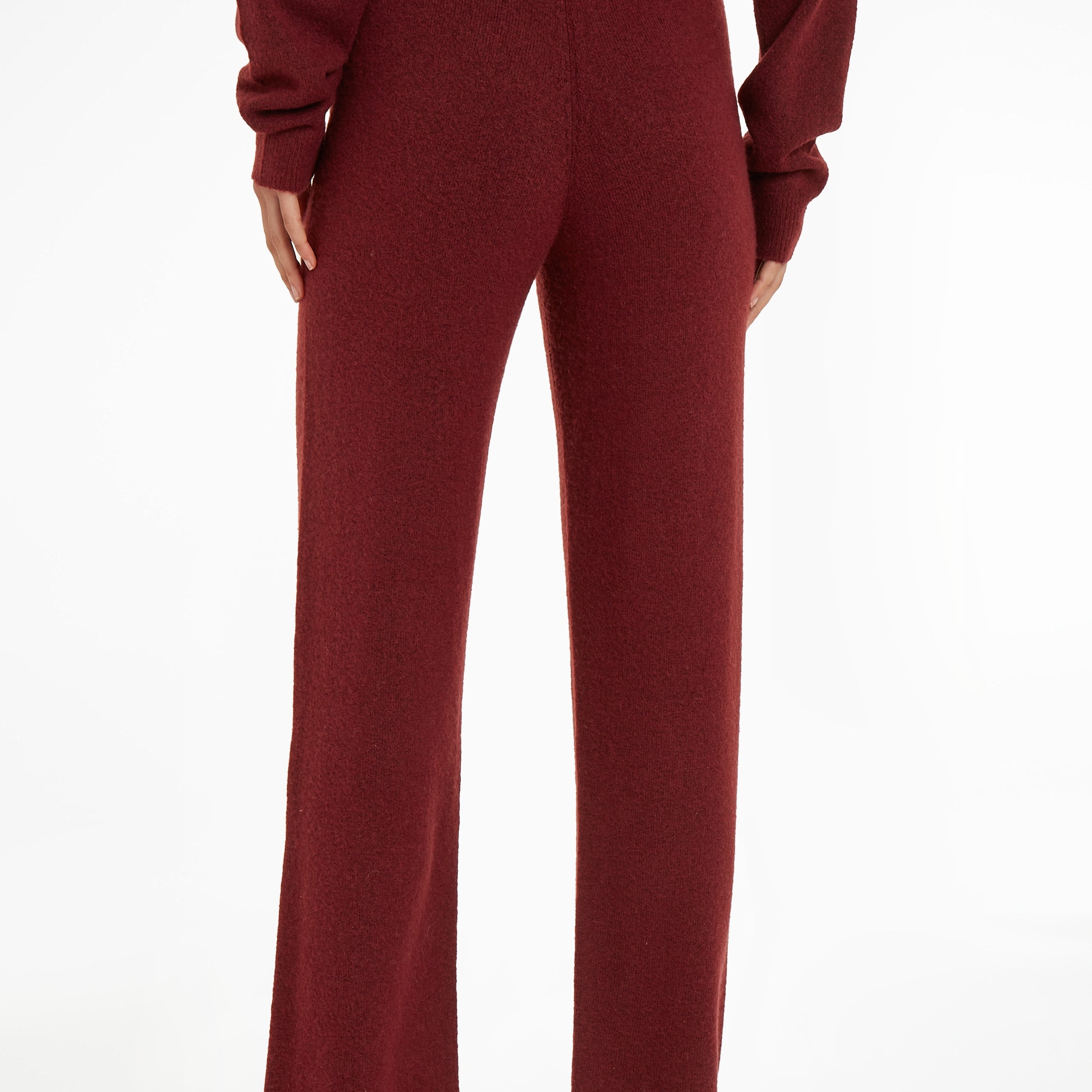 Calvin Klein Womens Pants Tawny Port Red, back view showcasing the soft fabric and regular fit of the loungewear.