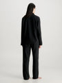 Calvin Klein L/S PANT SET UB1 Womens Pyjamas Black back view showcasing the relaxed fit and long sleeves.