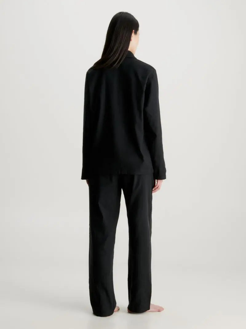 Calvin Klein L/S PANT SET UB1 Womens Pyjamas Black back view showcasing the relaxed fit and long sleeves.
