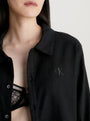 Calvin Klein L/S PANT SET UB1 Womens Pyjamas Black detail view with logo on black fabric