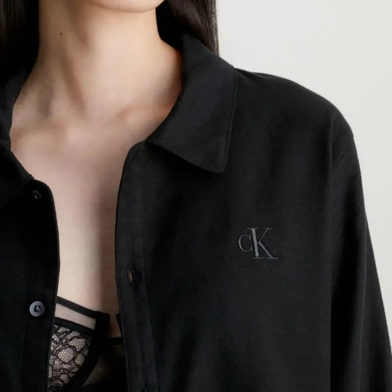Calvin Klein L/S PANT SET UB1 Womens Pyjamas Black detail view with logo on black fabric