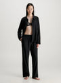 Calvin Klein L/S PANT SET UB1 Womens Pyjamas Black front view displaying relaxed fit and comfort material.