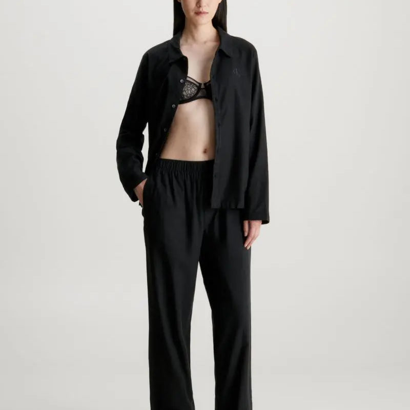Calvin Klein L/S PANT SET UB1 Womens Pyjamas Black front view displaying relaxed fit and comfort material.