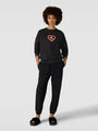 Calvin Klein CK96 Womens Lounge Sweatshirt Black front view model wearing relaxed fit.